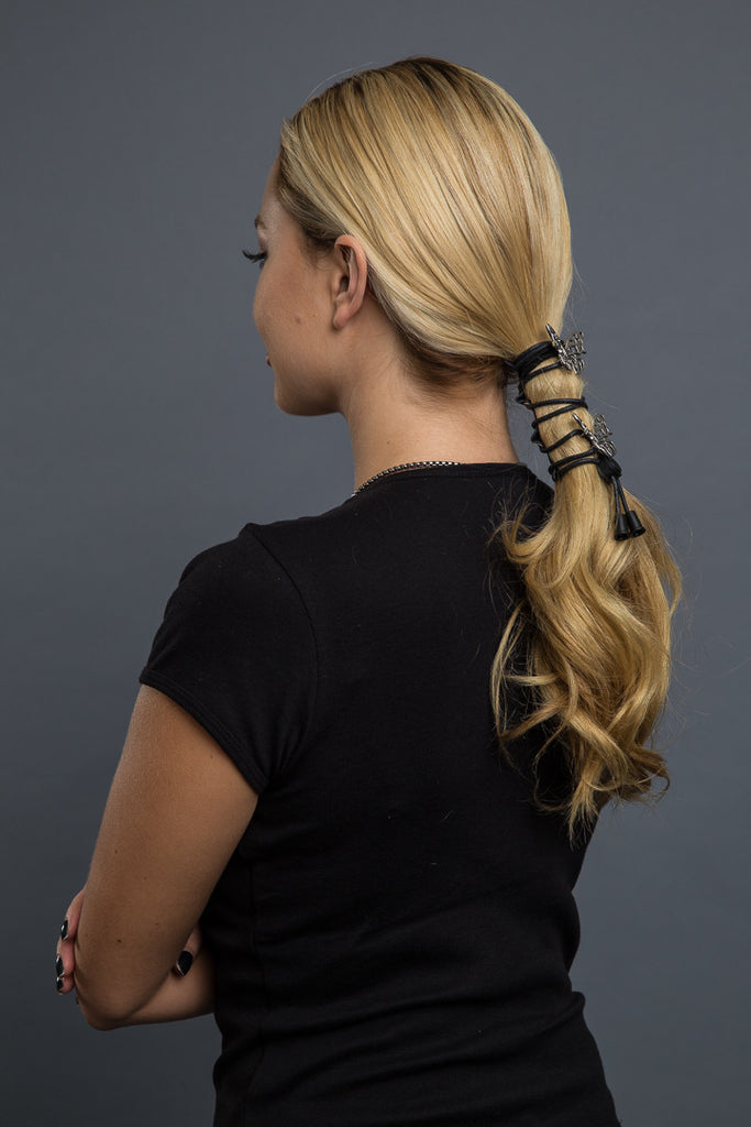 4"Lace Up Tribal Buttlerfly: Description
All Hair Gloves® come in snaps for easy use with elastic band and hook for non-slip