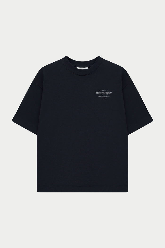 Black t-shirt with a small white logo on a white background