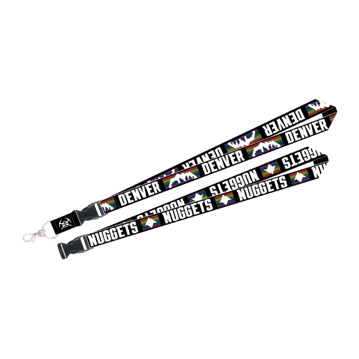 A black fabric neck lanyard with a plastic buckle and metal swivel clip. The strap is printed with repeating graphics, alternating between the white mountain and city skyline over rainbow stripes with the word 'DENVER', and the word 'NUGGETS' paired with the number '5280' and a small rainbow block