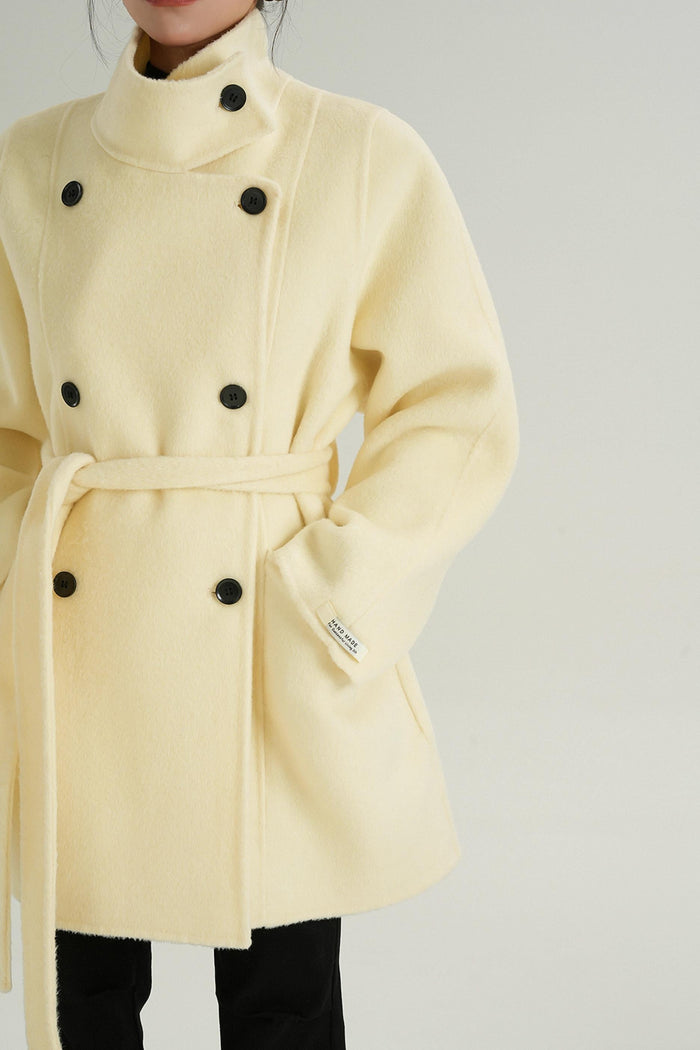 Tailored women's outerwear in cream color