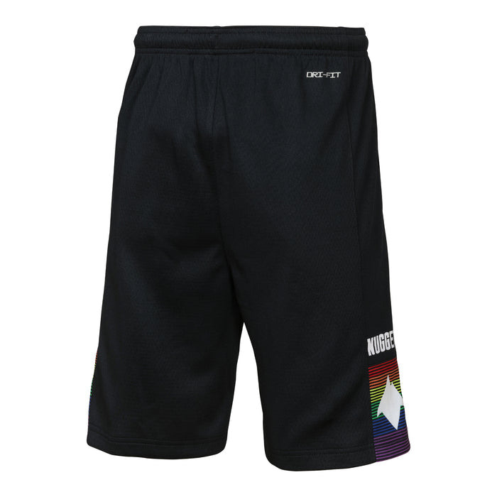 Rear-left view of the black basketball shorts, showing a solid black back construction with a small tone-on-tone brand tech stamp below the rear waistband. The colorful retro rainbow panel and white mountain cutout on the lower left leg remain partially visible from this angle