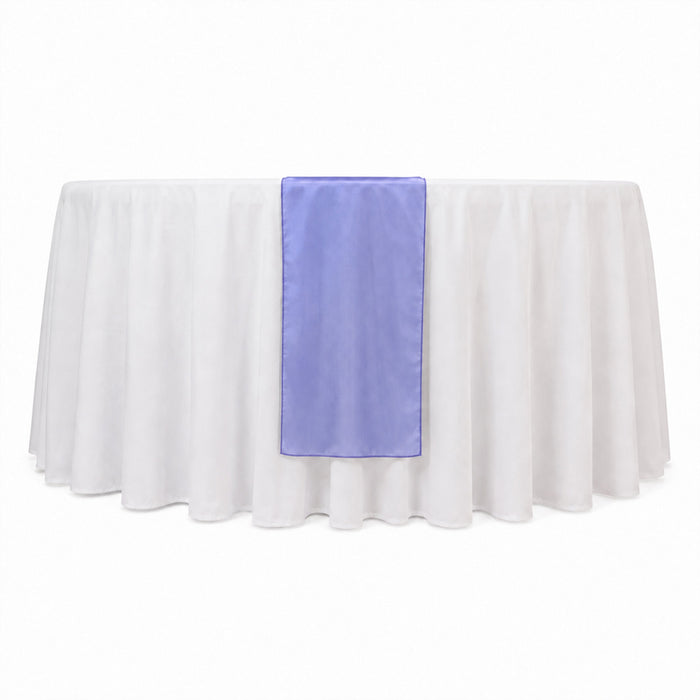 White round table with sheer overlay and lavender table runner