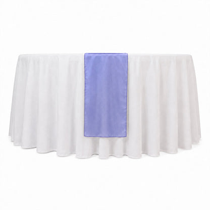 White round table with sheer overlay and lavender table runner
