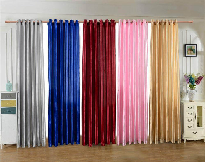 Colorful sheer curtains displayed in a stylish interior setting.