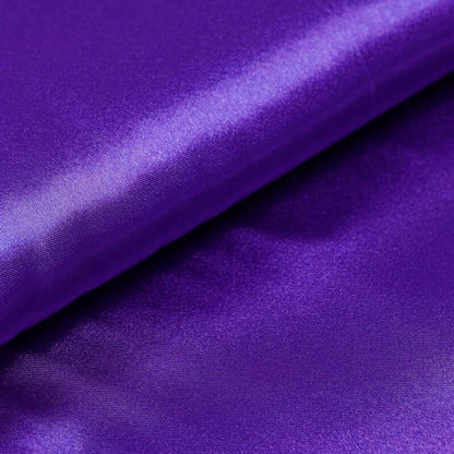 Purple satin fabric with a smooth, glossy texture. #whtbkgd