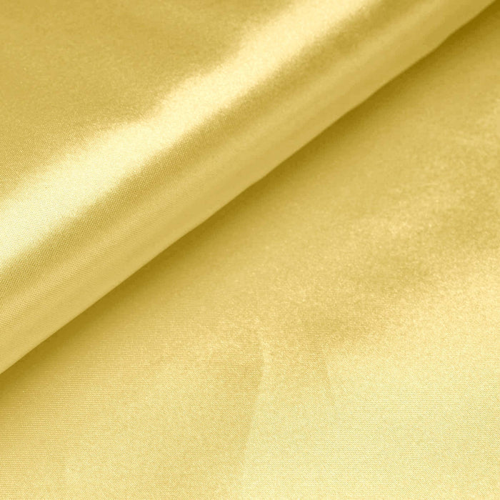 Yellow satin fabric with a smooth texture and sheen. #whtbkgd