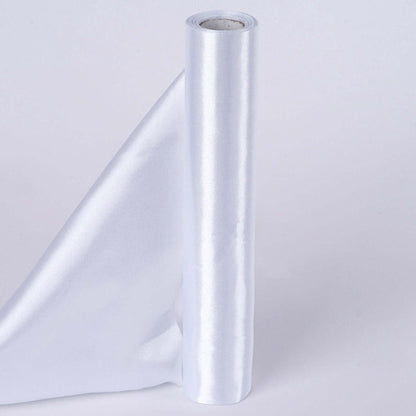 Shiny silver satin fabric roll on a white background