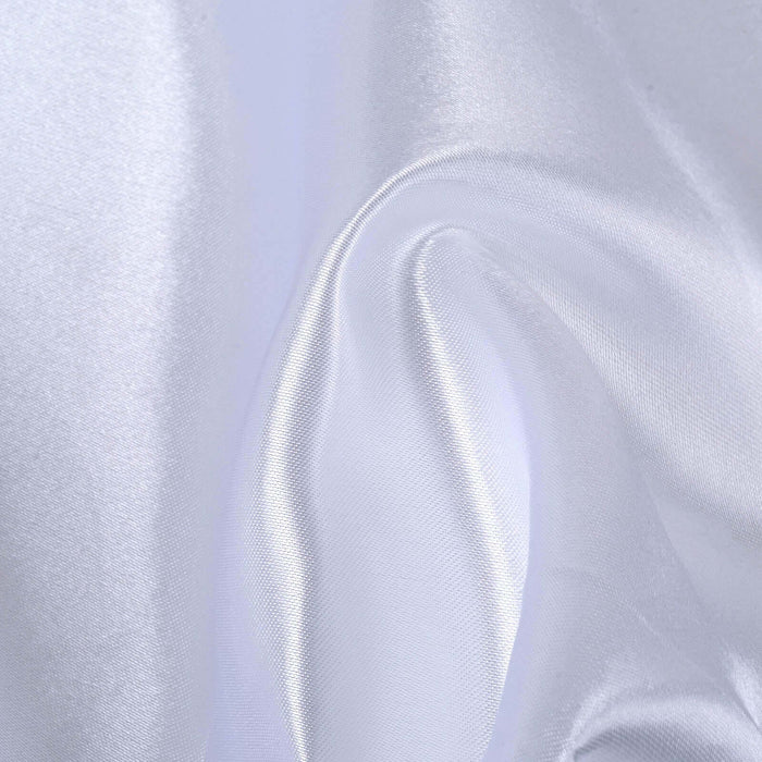 White satin fabric with smooth texture and gentle drape.
