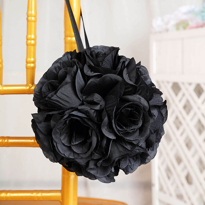 Black flower bouquet hanging from a chair.