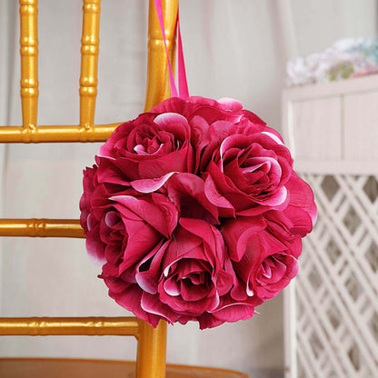 Pink floral bouquet hanging from a chair.