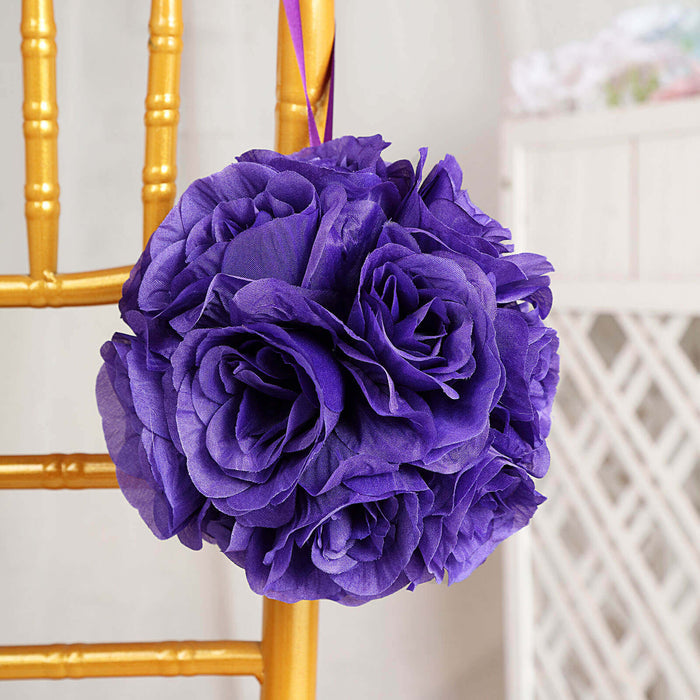 Purple paper flower bouquet hanging on a gold chair.