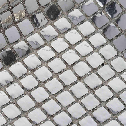 Shiny silver and white mosaic tile pattern for interior design or decor.