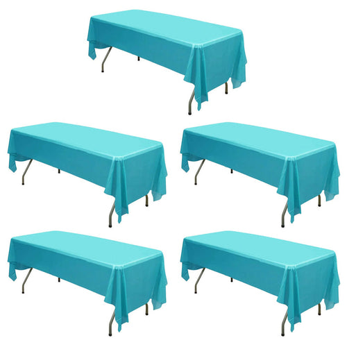 Set of five turquoise table covers on white background