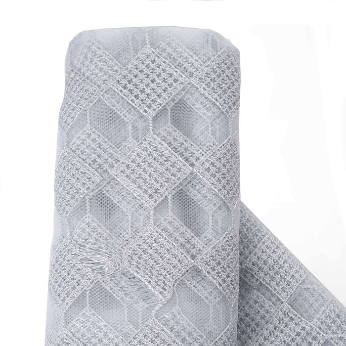 Gray geometric lace fabric roll on a white background