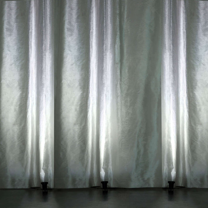 Elegant sheer curtains with soft light, creating a serene ambiance.