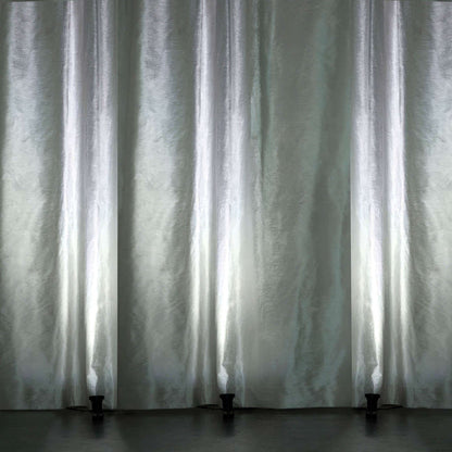 Elegant sheer curtains with soft light, creating a serene ambiance.