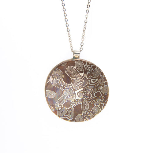 Claire Ramsey | Mokume Pendant #1