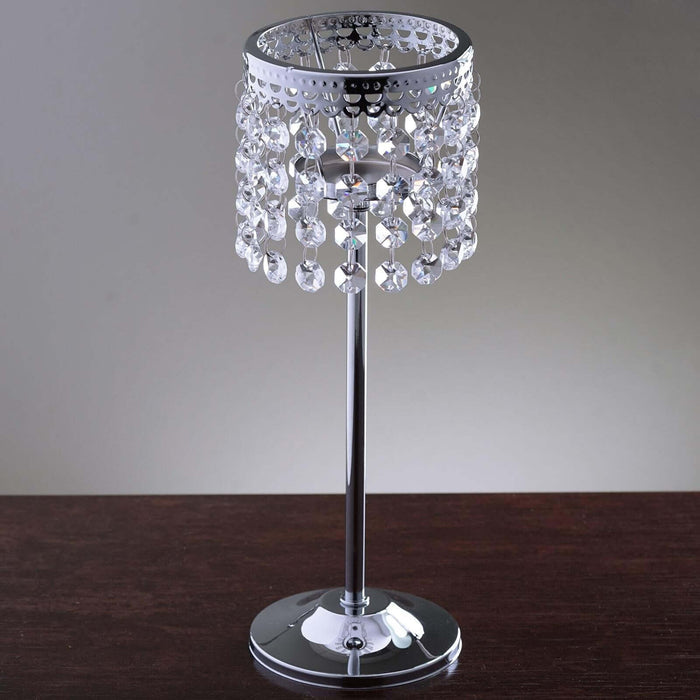 Elegant crystal table lamp with chrome finish and beaded shade.