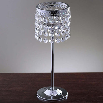 Elegant crystal table lamp with chrome finish and beaded shade.