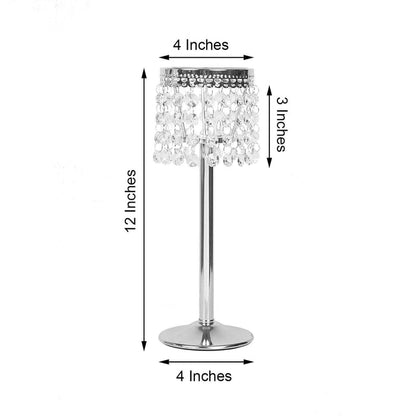 Crystal table lamp with silver base, 12 inches tall, 4 inches wide.