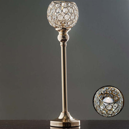 Elegant crystal ball table lamp with a polished gold base.