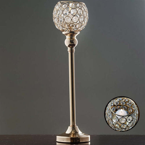 Elegant crystal ball table lamp with a polished gold base.