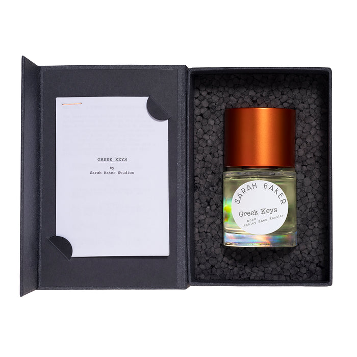 Sarah Baker Perfumes Greek Keys 50ml Extrait de Parfum open gift box with bottle and booklet on black foam packing insert