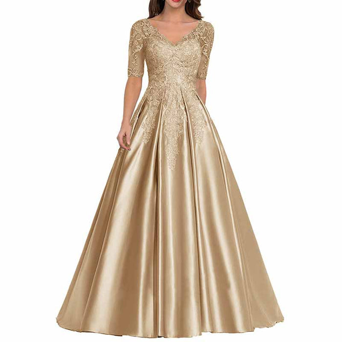 Elegant mother of the bride satin dress in gold with lace detailing and a flattering silhouette