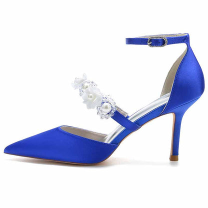 Elegant blue satin bridal heels with ankle strap and decorative floral detail for weddings