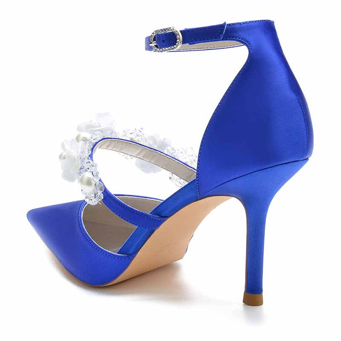 Elegant blue satin bridal heels with ankle strap featuring decorative floral embellishments