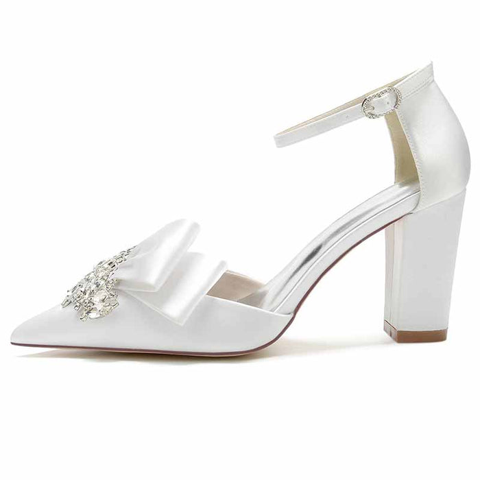 Elegant white S&DCo. wedding shoes with a bow and block heel, perfect comfortable wedding shoes for women