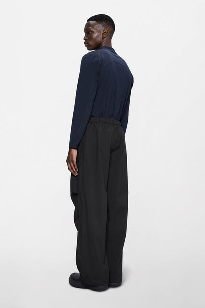 RAINS Suva Hardshell Pants Wide Black Pants