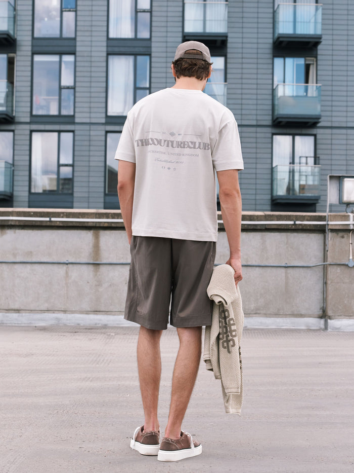 TONAL COPYRIGHT MULTI GRAPHIC T-SHIRT - STONE